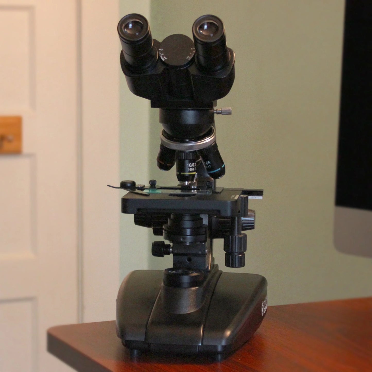 Photograph of a black microscope