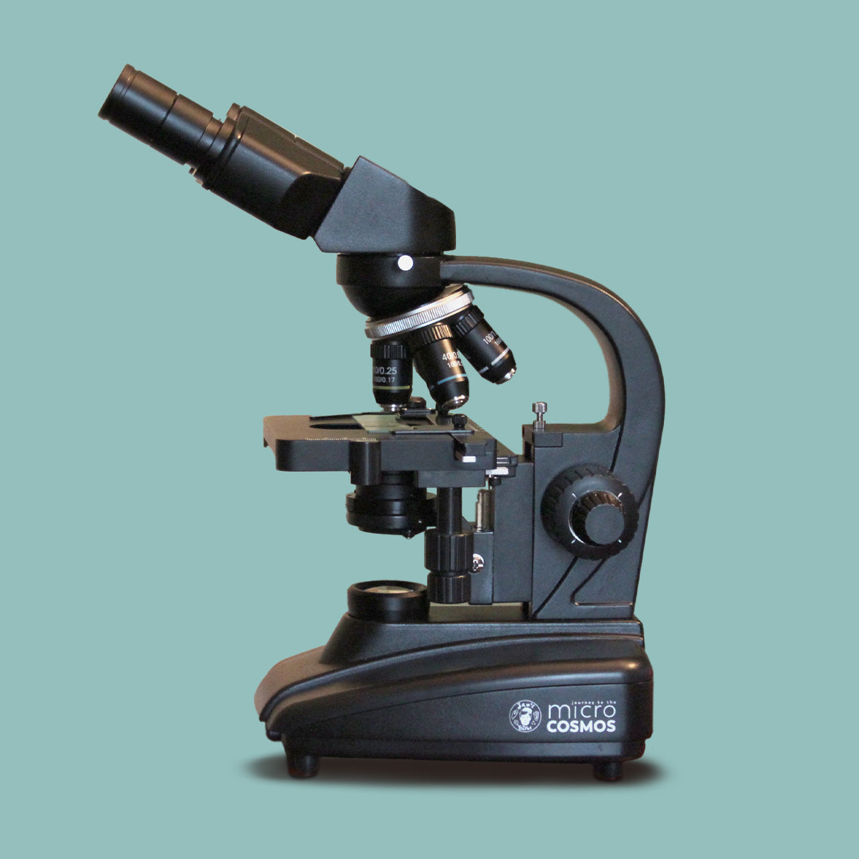 A microscope on a turquoise background with a Microcosmos logo on the base.